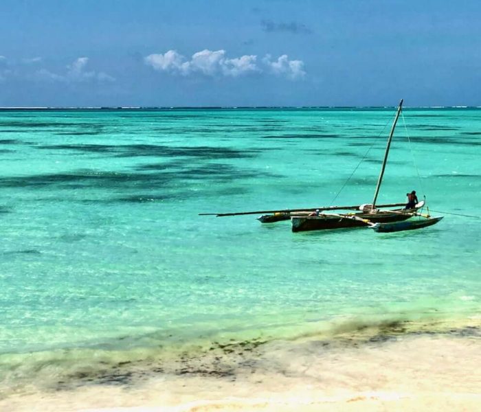 Take a locally built wooden boat to Prison Island2